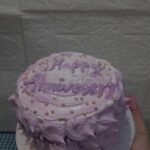 Elegant anniversary cake custom design Karachi home baker