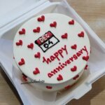 Anniversary bento cake with red hearts.