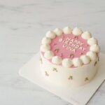 Pink minimalist cake Sweet Bakeistan Karachi.