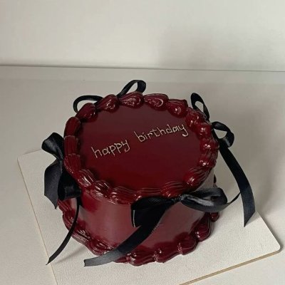 Dark chocolate heart cake happy birthday black ribbon custom Karachi