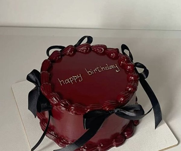 Dark chocolate heart cake happy birthday black ribbon custom Karachi