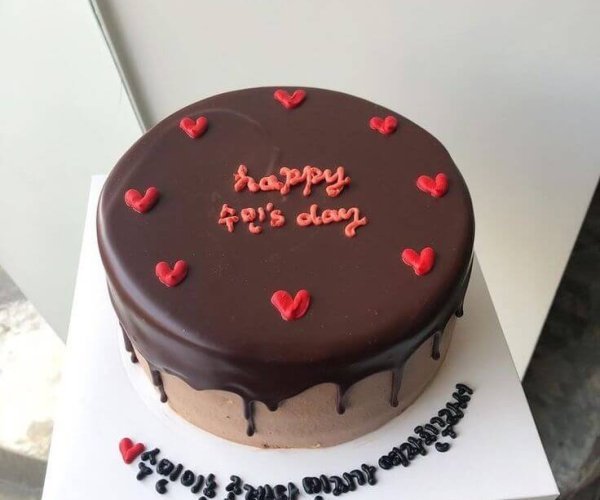 Dark chocolate drip cake red hearts custom message birthday Karachi