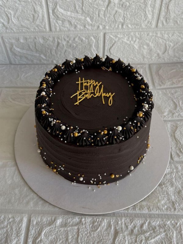 Dark chocolate birthday cake gold text pearls custom Karachi