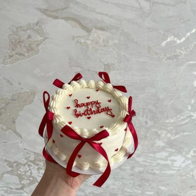 White bento cake happy birthday red ribbon custom Karachi
