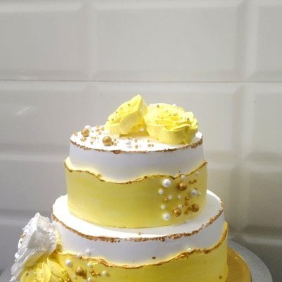 two tier elegant custom cake gold pearls Karachi