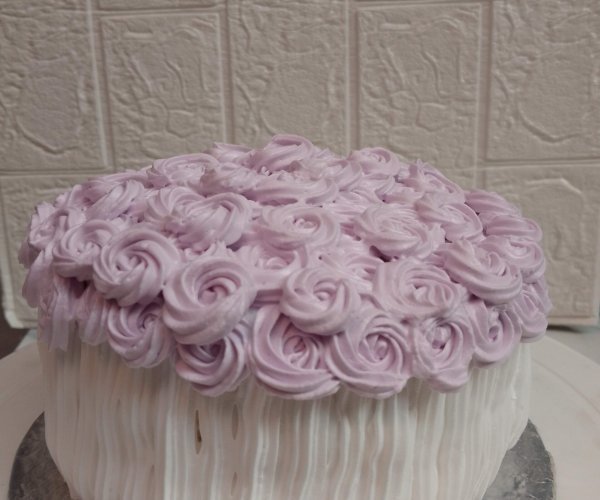 Purple buttercream rosette cake.